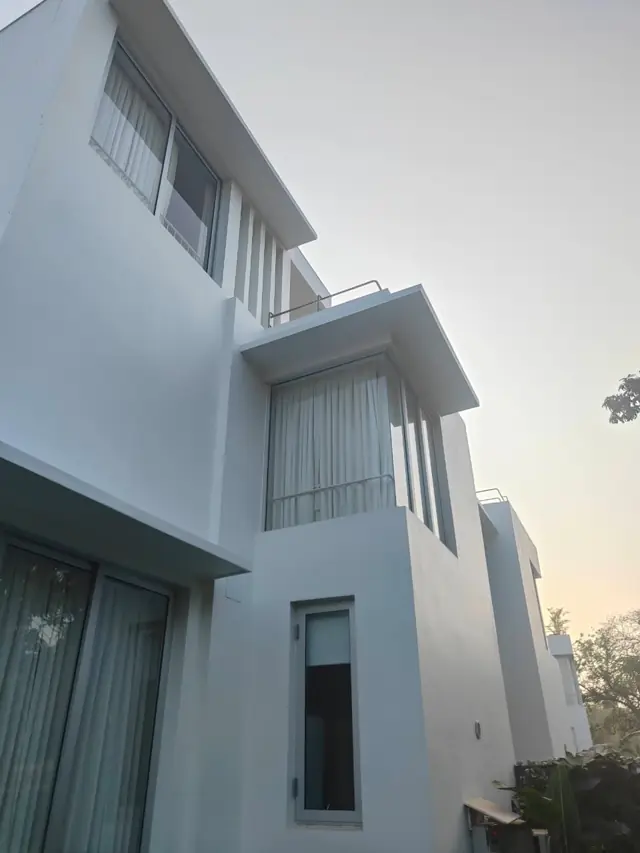 White FRP chajjas on a villa