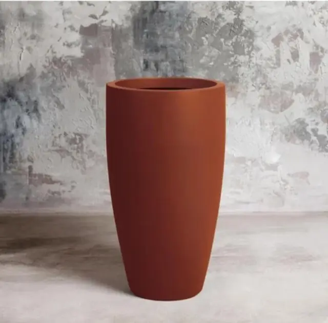 Tall terracotta-colour FRP planter