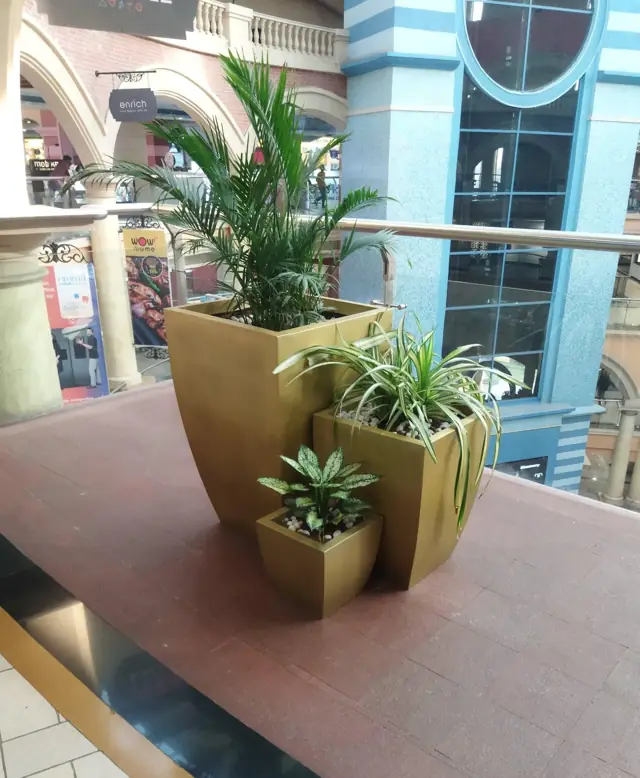Set of gold FRP planters