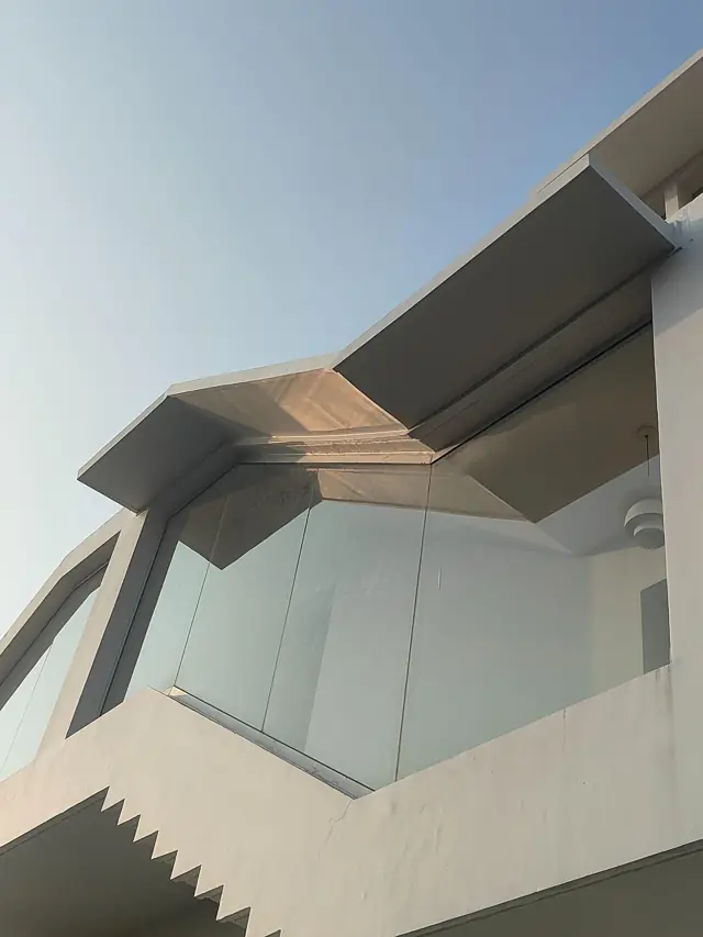 Modern FRP chajja on a villa